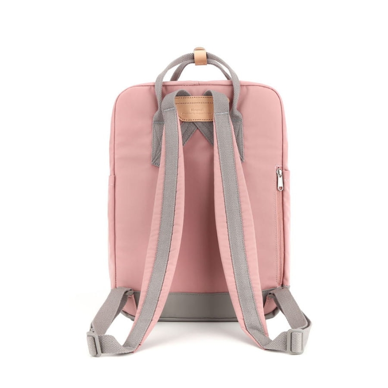 Pojemny i praktyczny plecak damski w jasnoróżowym kolorze zawieszony na regulowanych szelkach - Himawari