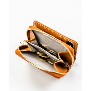 Brązowy portfel damski ze skóry ekologicznej zamykany na suwak i zatrzask - Peterson