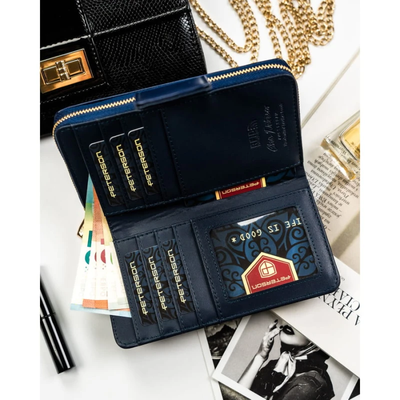 Portfel damski ze skóry ekologicznej zamykany na zatrzask i suwak. Portfel w granatowym kolorze - Peterson