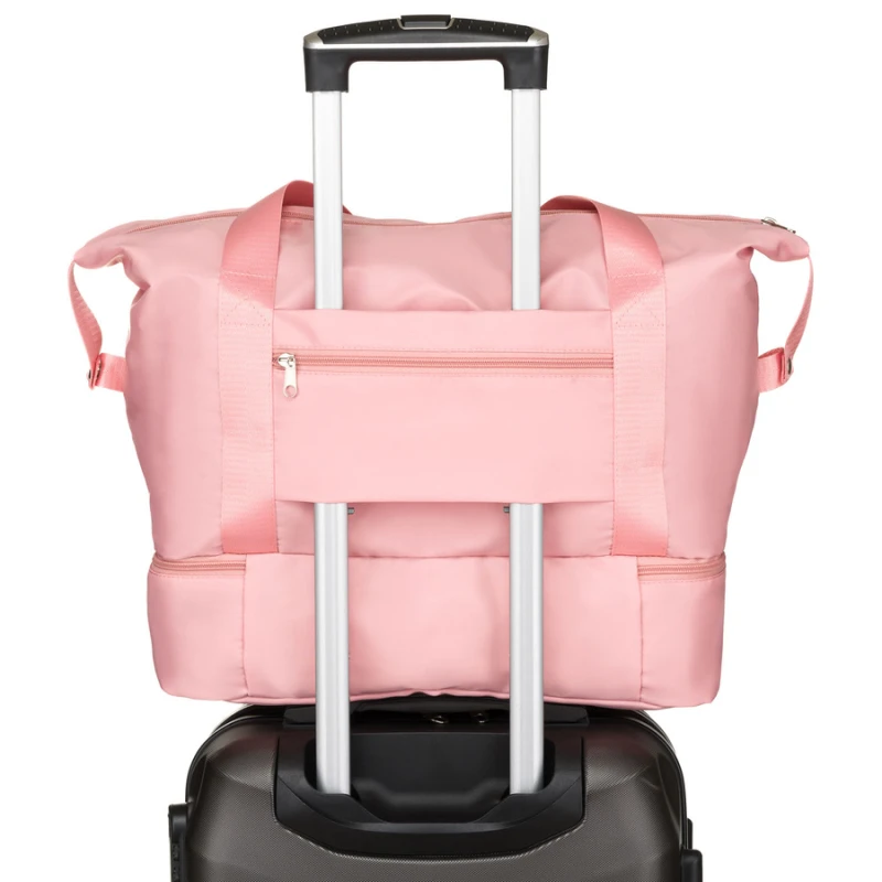 Różowa torba weekendowa z wytrzymałego poliestru zawieszona na wygodnych uchwytach - Peterson