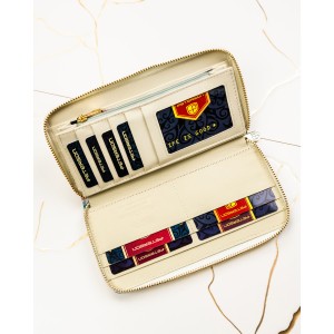 Portfel-piórnik damski w kwiaty wykonany ze skóry naturalnej i ekologicznej zamykany suwakiem - Peterson