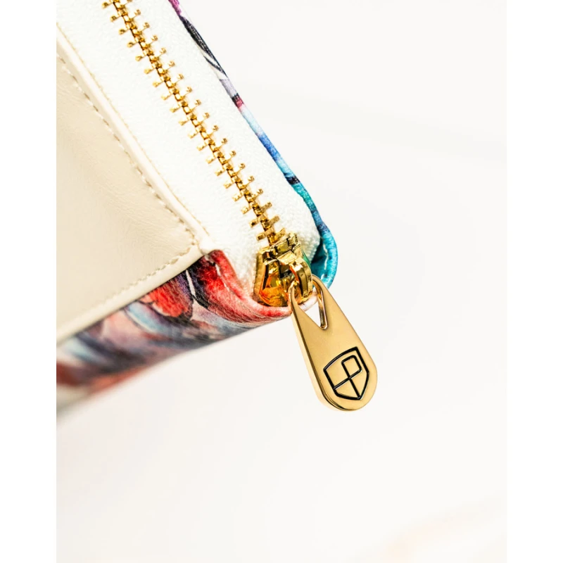 Portfel-piórnik damski w kwiaty wykonany ze skóry naturalnej i ekologicznej zamykany suwakiem - Peterson