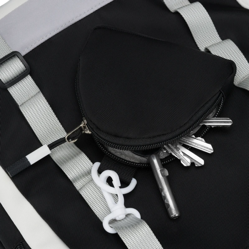 Białoczarny plecak szkolny z poliestru z poręczną dodatkową saszetką - Peterson