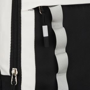 Białoczarny plecak szkolny z poliestru z poręczną dodatkową saszetką - Peterson