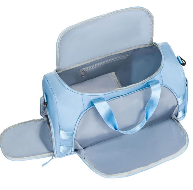 "Wnętrze torby Peterson z przestronną komorą główną i zasuwaną kieszonką na drobiazgi."