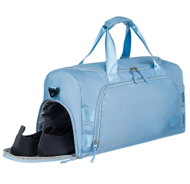 "Boczna komora na buty w torbie podróżnej Peterson, zapewniająca oddzielne przechowywanie obuwia."