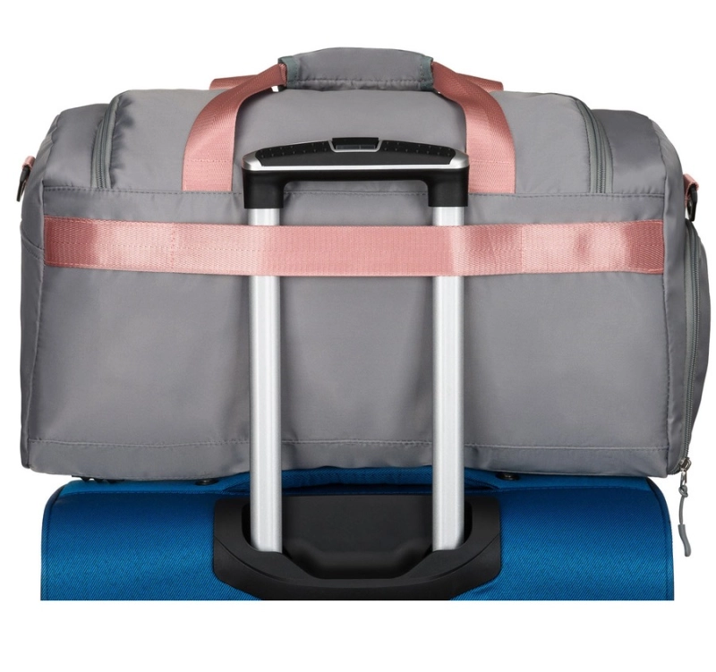 Torba z regulowanym paskiem i uchwytem na walizkę