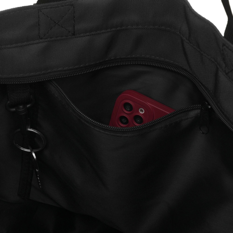 Pojemna czarna shopperka damska zamykana suwakiem z kieszonką zewnętrzną - Peterson