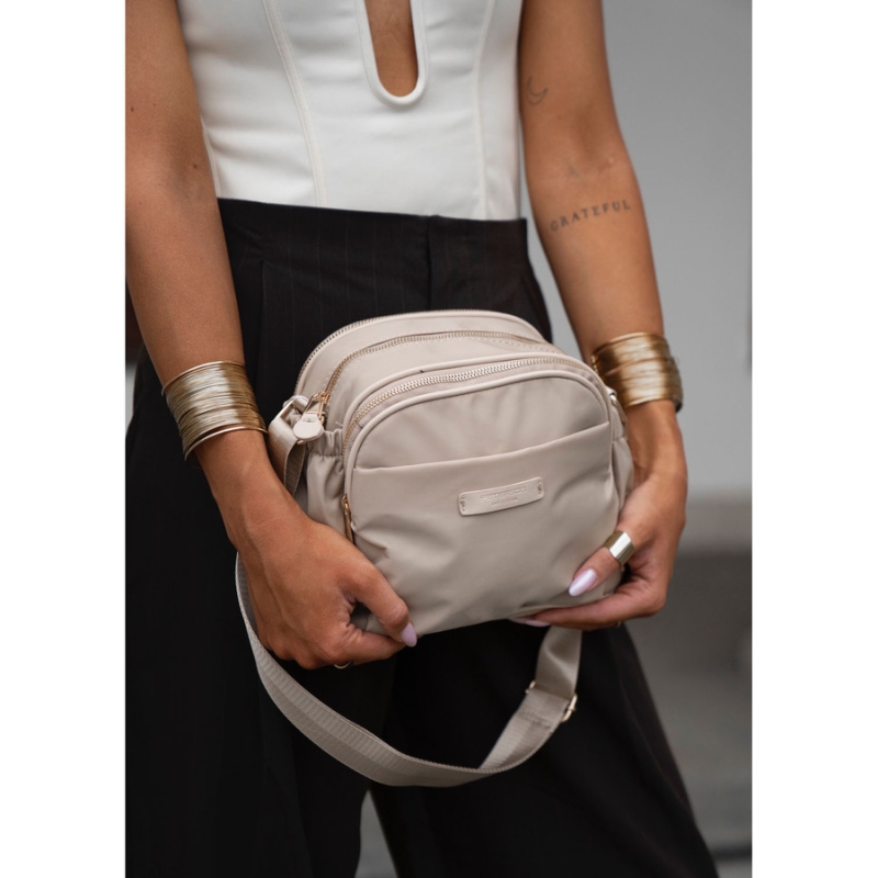 Stylowa nylonowa, beżowa listonoszka damska z sześcioma dodatkowymi kieszeniami - Peterson