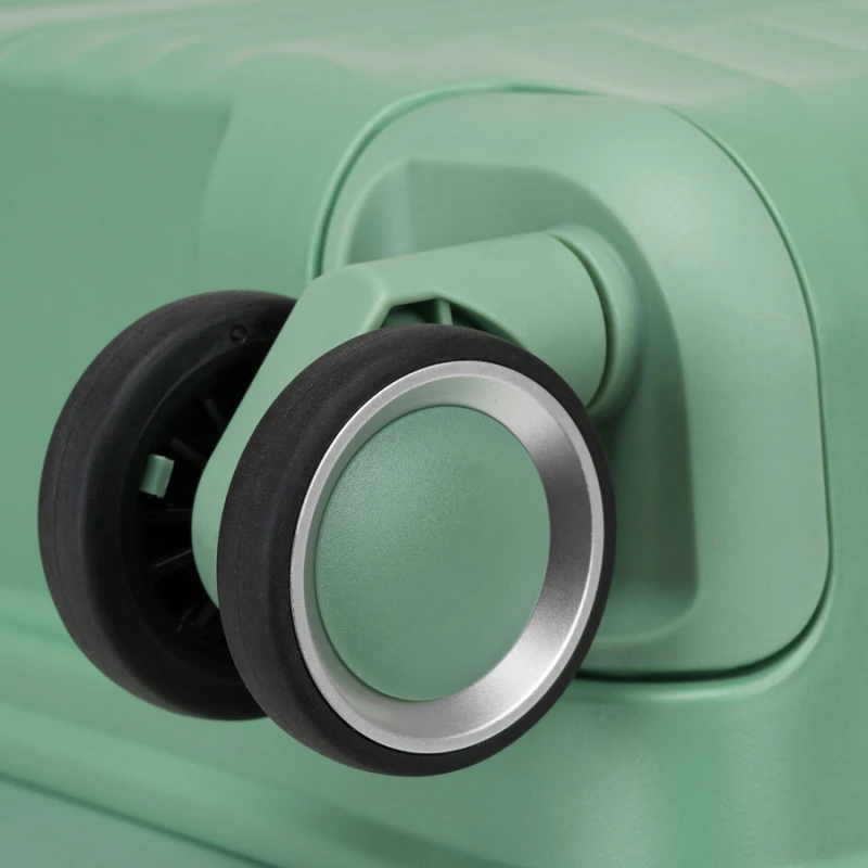 Zielona, średnia walizka podróżna z teleskopowym uchwytem i kółkami obrotowymi - Peterson