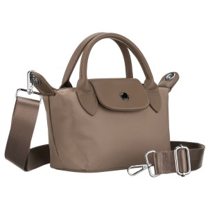 Listonoszka damska z poliestru w beżowym kolorze, jednokomorowa i zamykana magnesem - Peterson