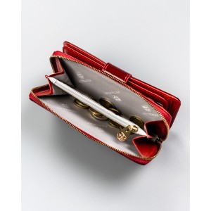 Pionowy portfel damski z lakierowanej skóry naturalnej w czerwonym kolorze - Peterson | Niua.pl