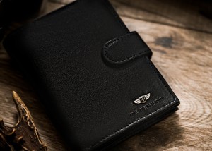 Skórzany portfel męski z zapięciem - Peterson | Niua.pl