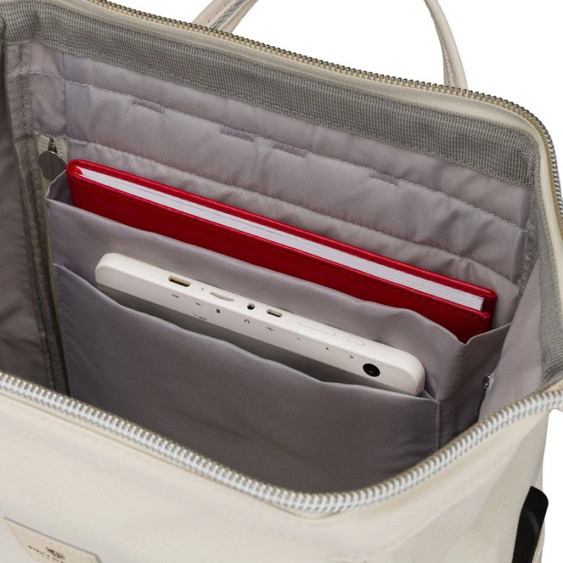 Plecak damski z poliestru w kolorze ecru z miejscem na laptopa i portem USB - Peterson | Niua.pl