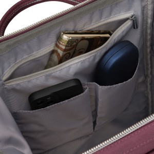 Fioletowy plecak damski z poliestru z miejscem na laptopa i portem USB - Peterson | Niua.pl