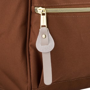 Beżowo-brązowy plecak damski z poliestru z miejscem na laptopa - Peterson | Niua.pl