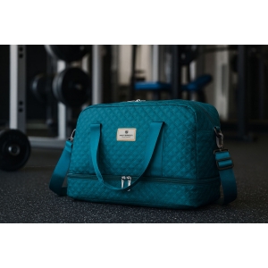 Zielona torba sportowa Peterson – regulowany pasek i wygodne uchwyty do noszenia na ramieniu i w dłoni