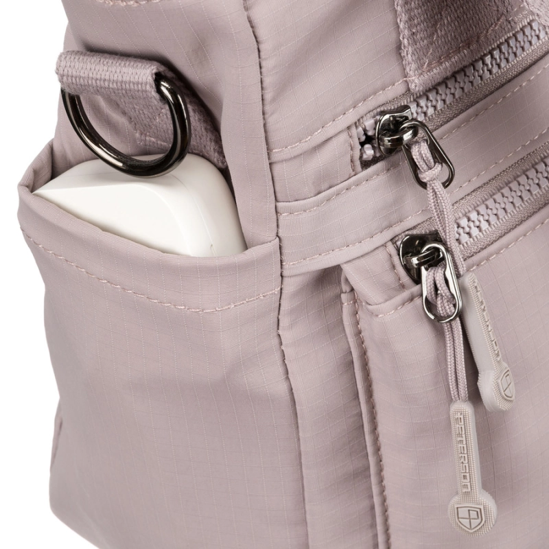 Niewielka shopperka damska z poliestru w kolorze lila z kieszeniami zamykanymi na suwak - Peterson