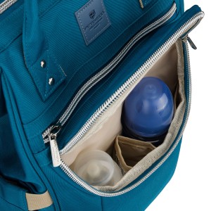 Plecak mommy-bag wykonany z poliestru w turkusowym kolorze, zamykany suwakiem - Peterson