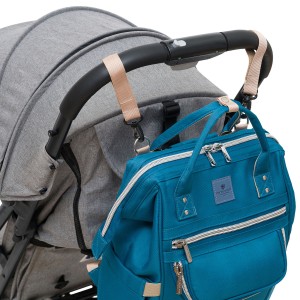 Plecak mommy-bag wykonany z poliestru w turkusowym kolorze, zamykany suwakiem - Peterson